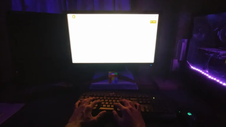 typing on the computer with white screen